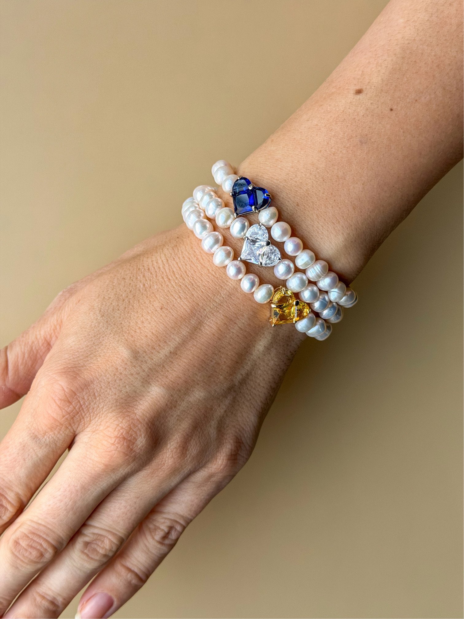 Браслеты из жемчуга с кристальным сердцем