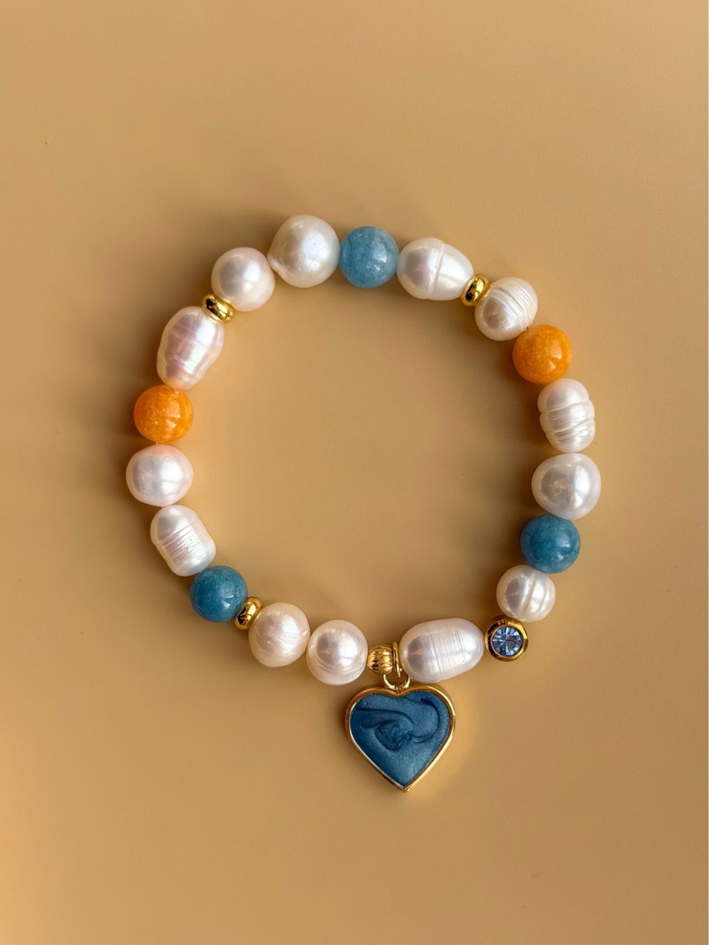 Браслет из микса жемчуга  с подвеской сердце